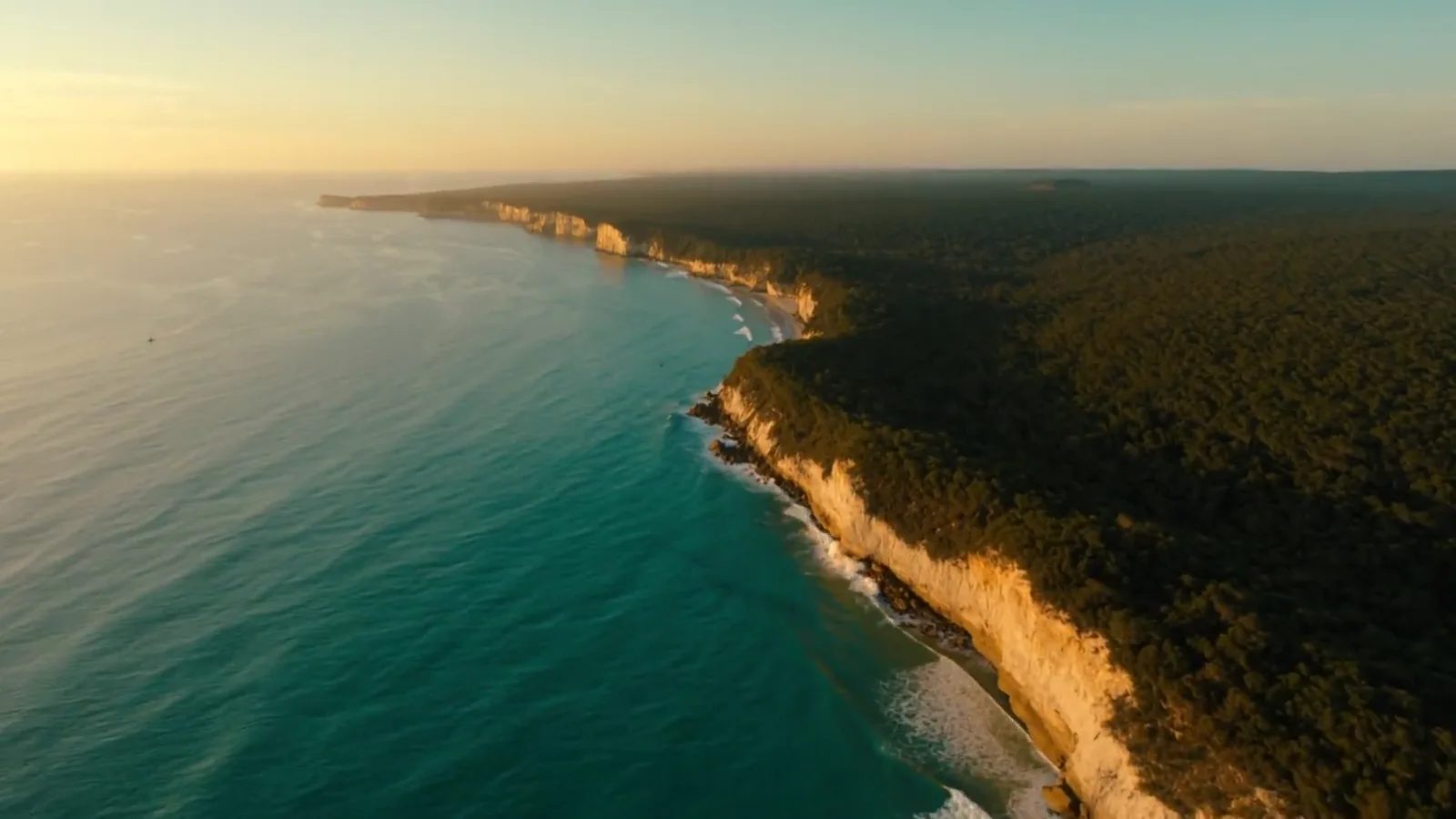 Australian coastline seen from above in soft morning light